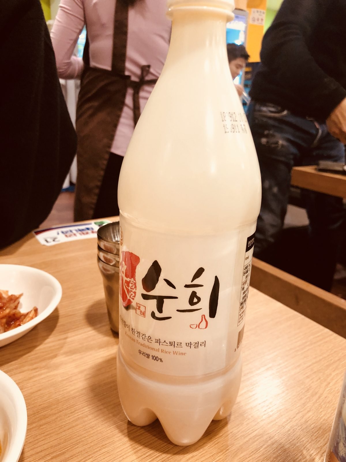 A bottle of makgeolli rice wine at Gwangjang Market