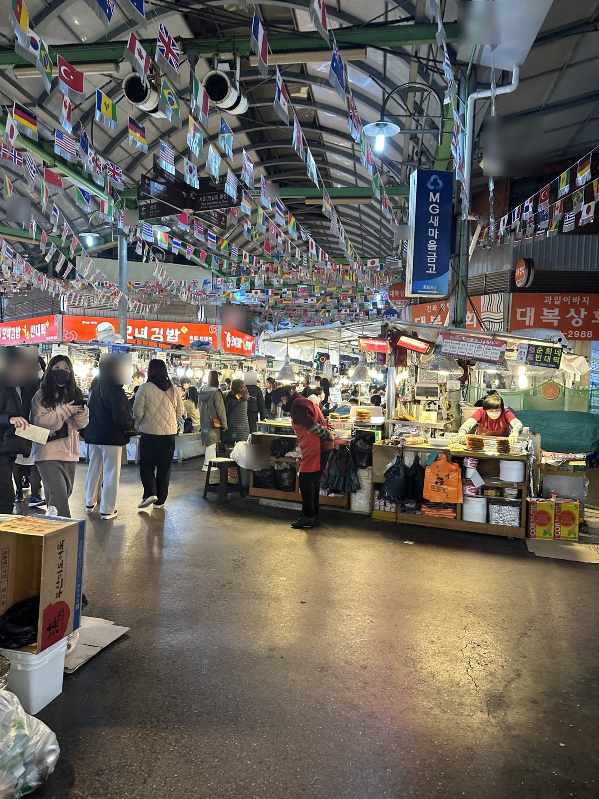 The covered food alley at Gwangjang Market in Seoul
