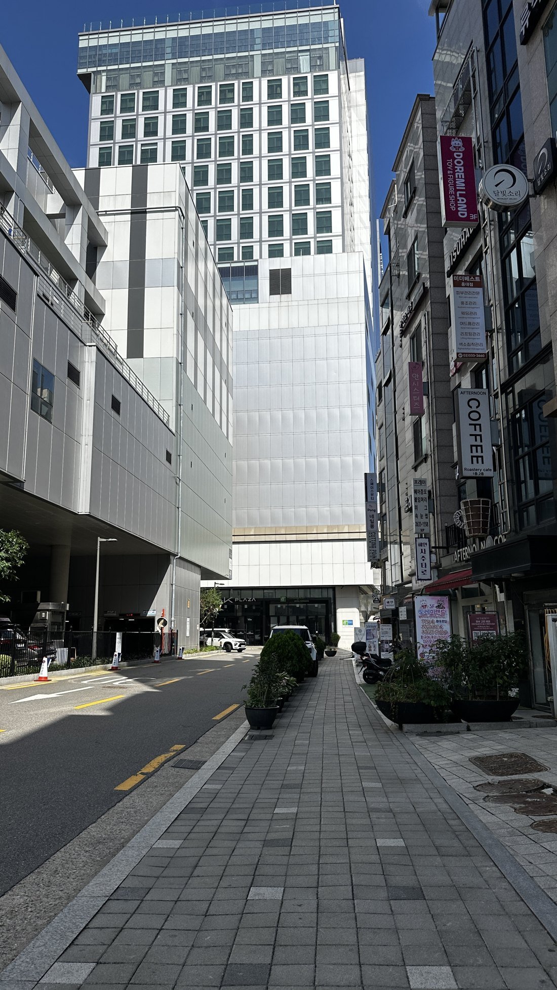 AK Plaza (AK& Hongdae) building above the AREX entrance at Hongik Univ Station